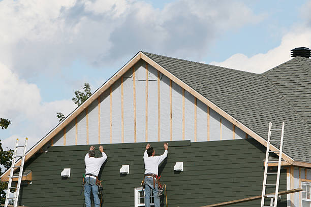 Professional Siding Contractor technician working in Coal Township, PA